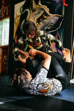 WOMEN'S TECHNO CAMO LONG SLEEVE RASHGUARD